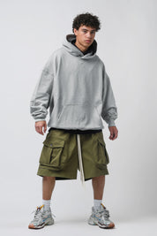 Bermuda shorts with green pocket